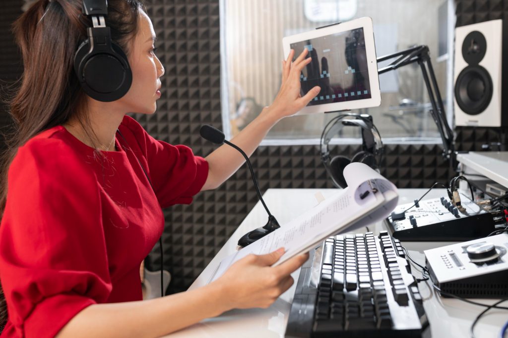 woman working radio with professional equipment