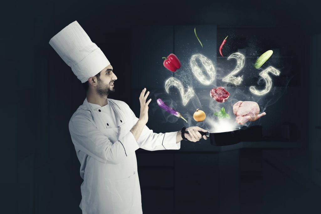 happy male magician chef cooking saucepan with flying food ingredients